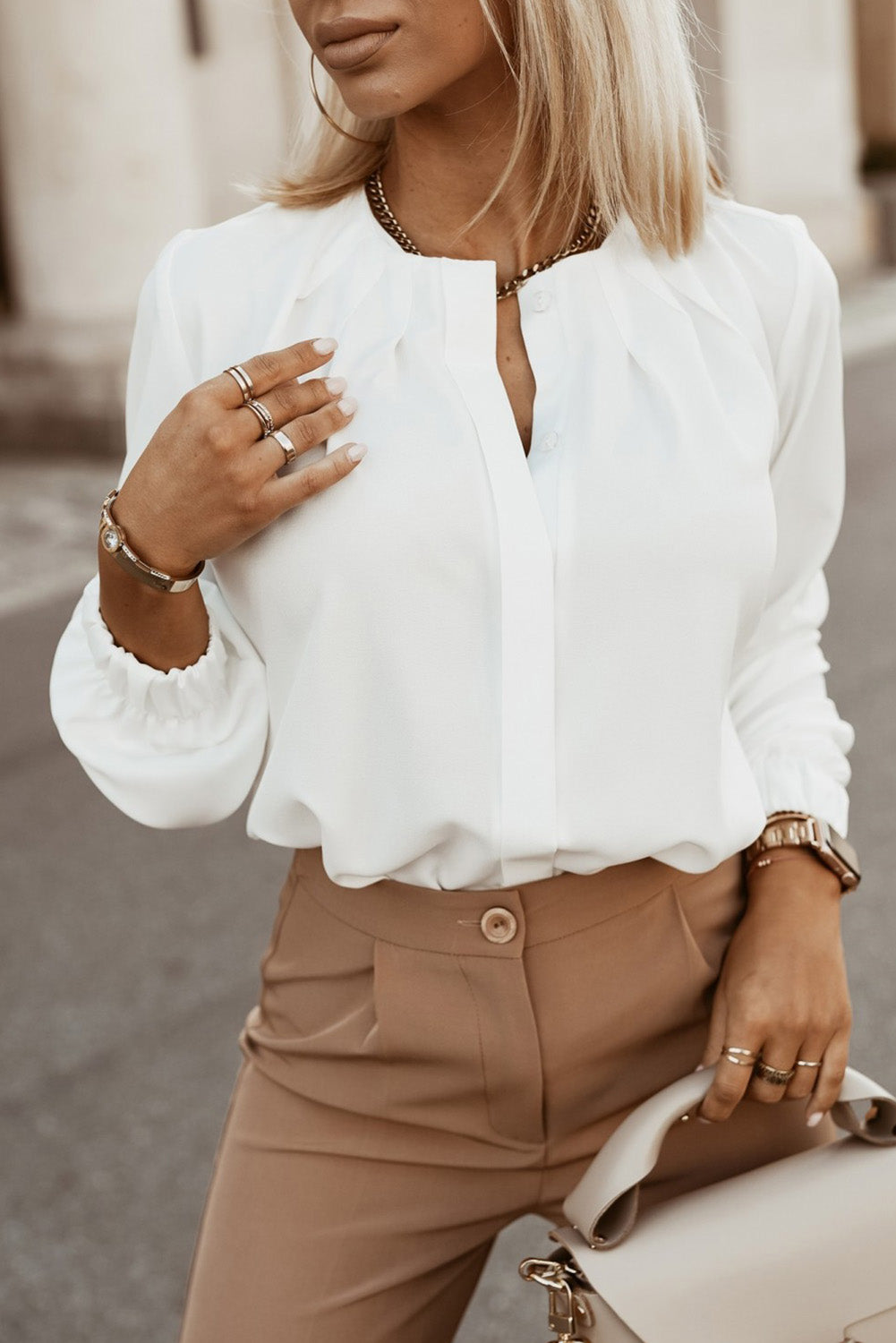 Camisa de manga larga con cuello redondo y botones