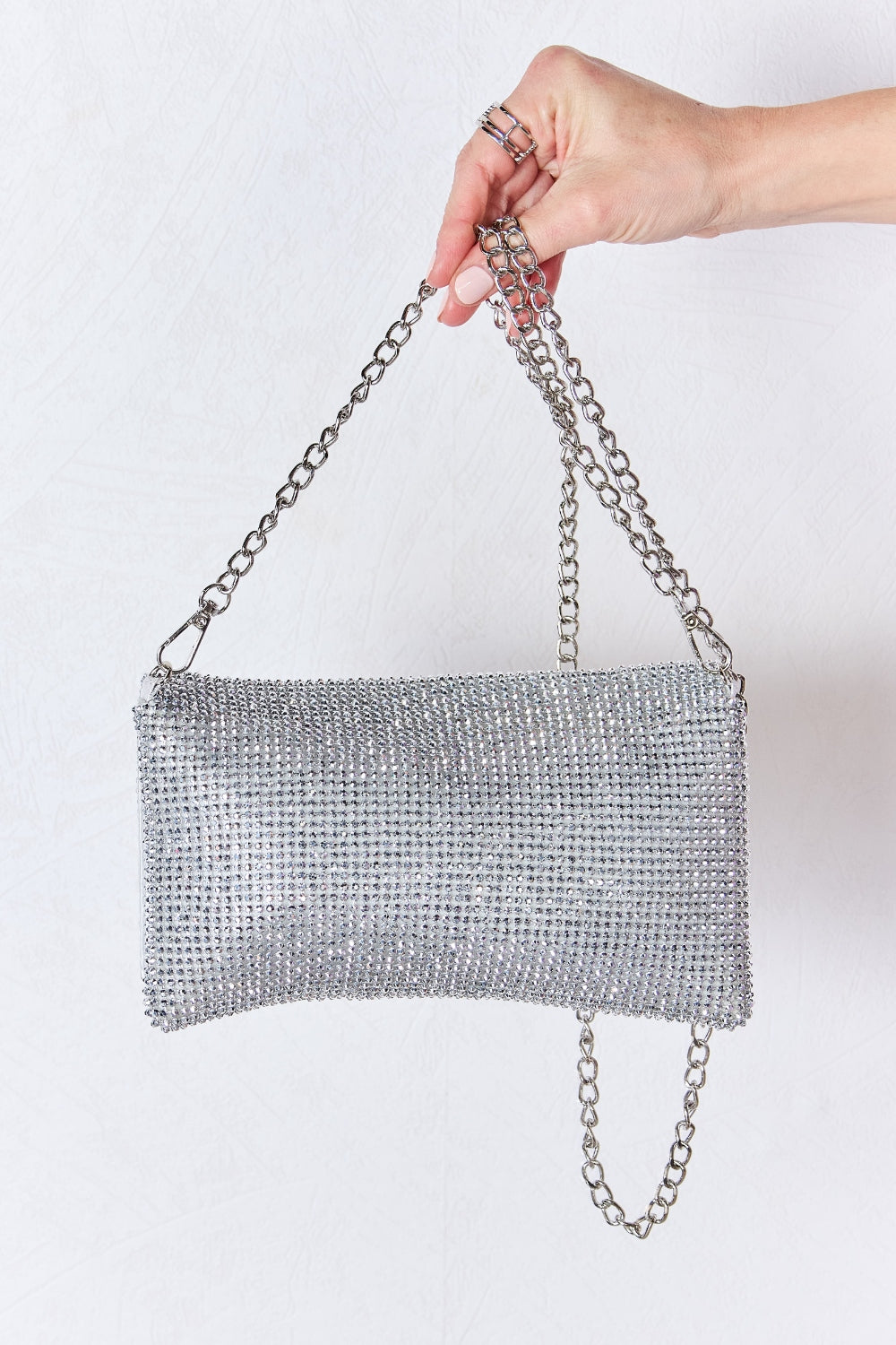 Bolso bandolera con strass y eslabones de Forever