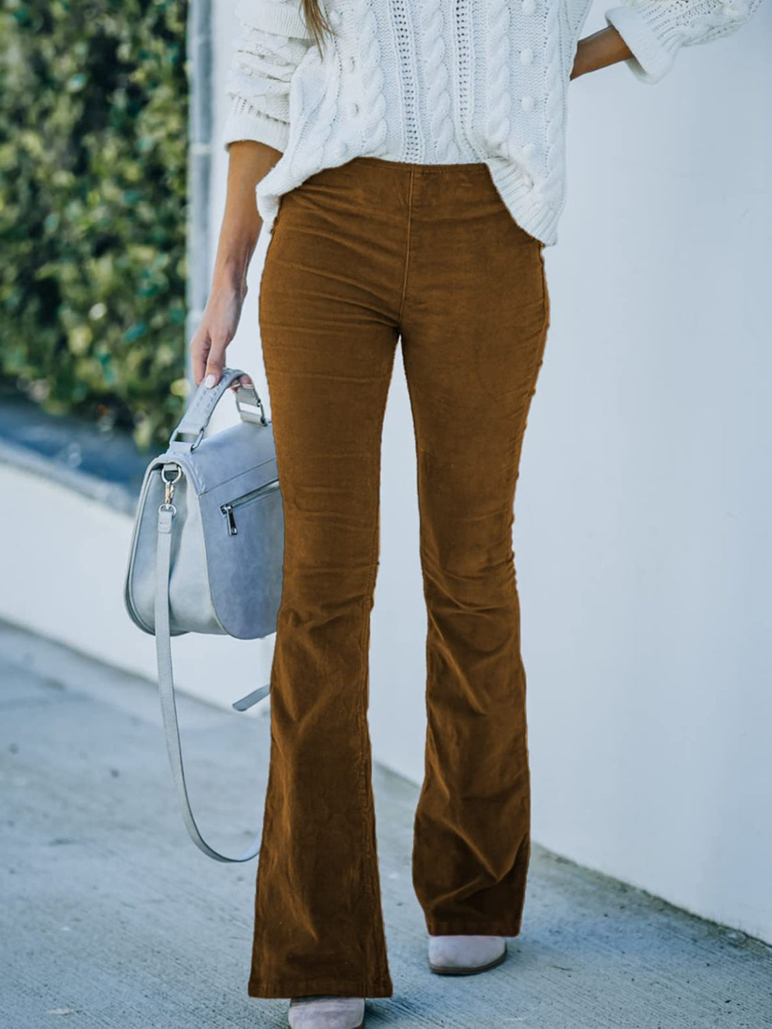 Pantalones con corte de bota de cintura alta